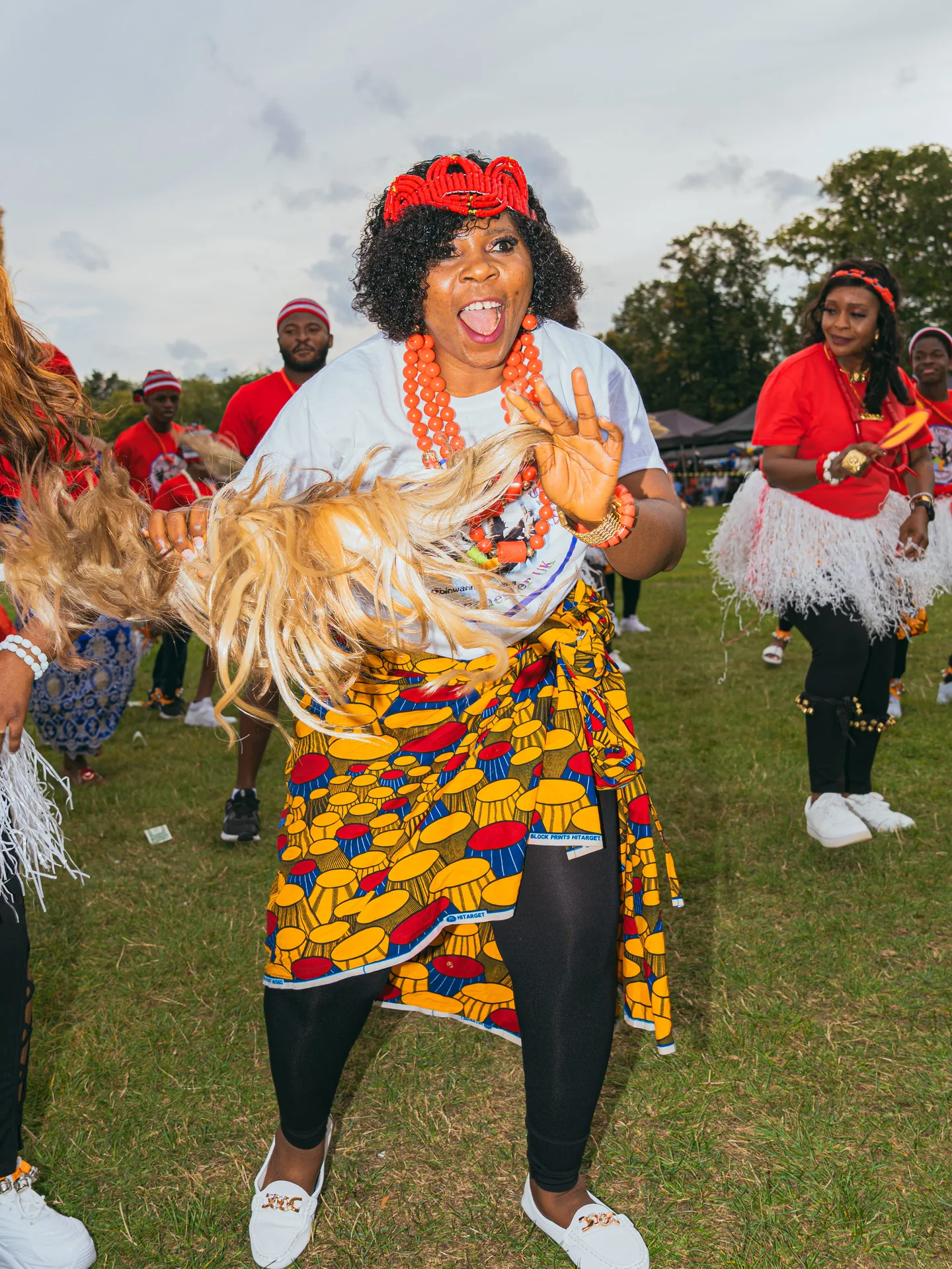 A dancer celebrating with a horsetail fan